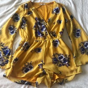 Indulge Yellow Floral Long Bell Sleeve Romper